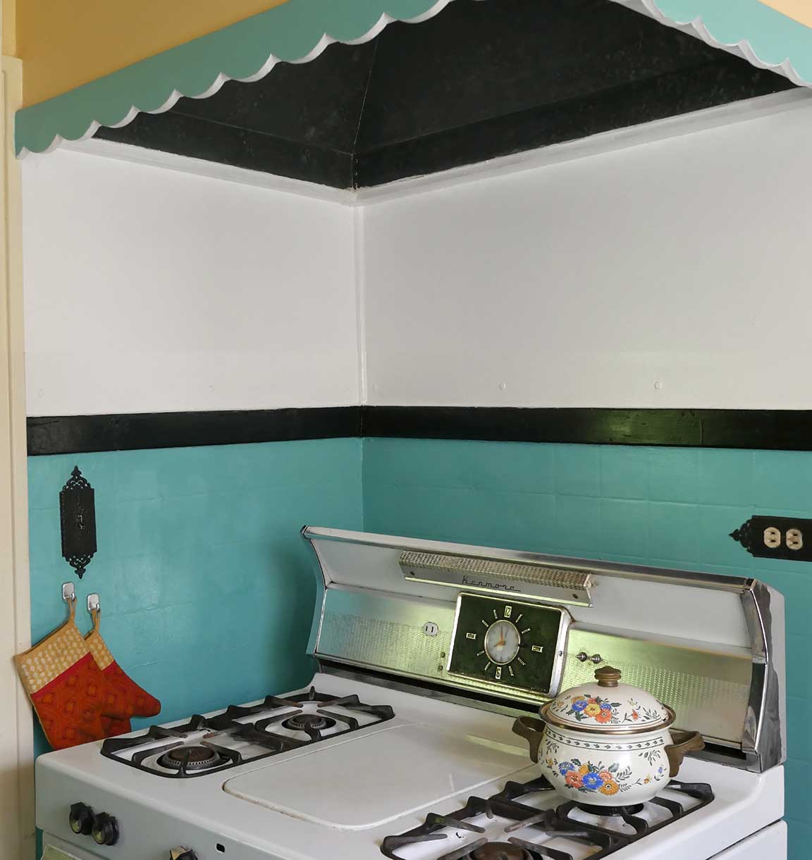 restored stove hood and repainted wall
